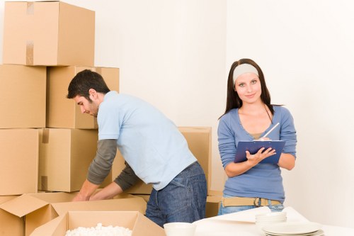 Local packing team in Northolt labeling boxes for an organized move