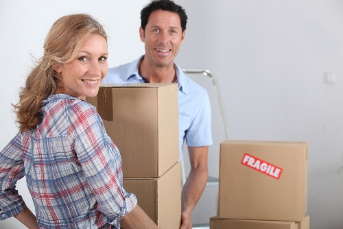 Local removal team handling furniture and boxes in Northolt