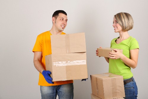 Northolt packers organising fragile items with protective wrapping
